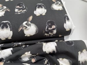 Bomuldsjersey - med søde kaniner på gråsort bund